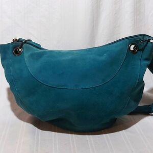 32. REVERSE LEATHER SUEDE CROSSBODY BAG!